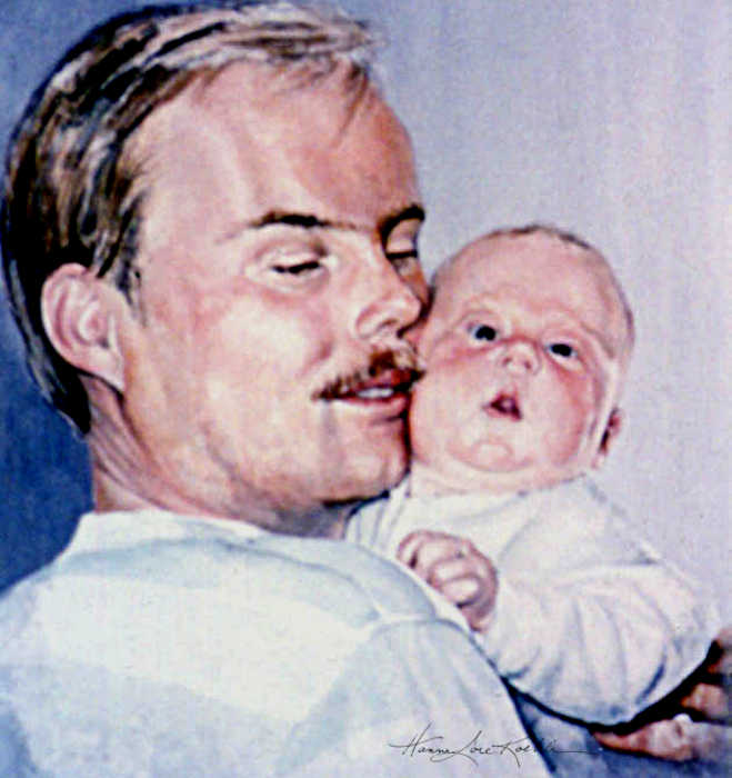 portrait of father and new baby